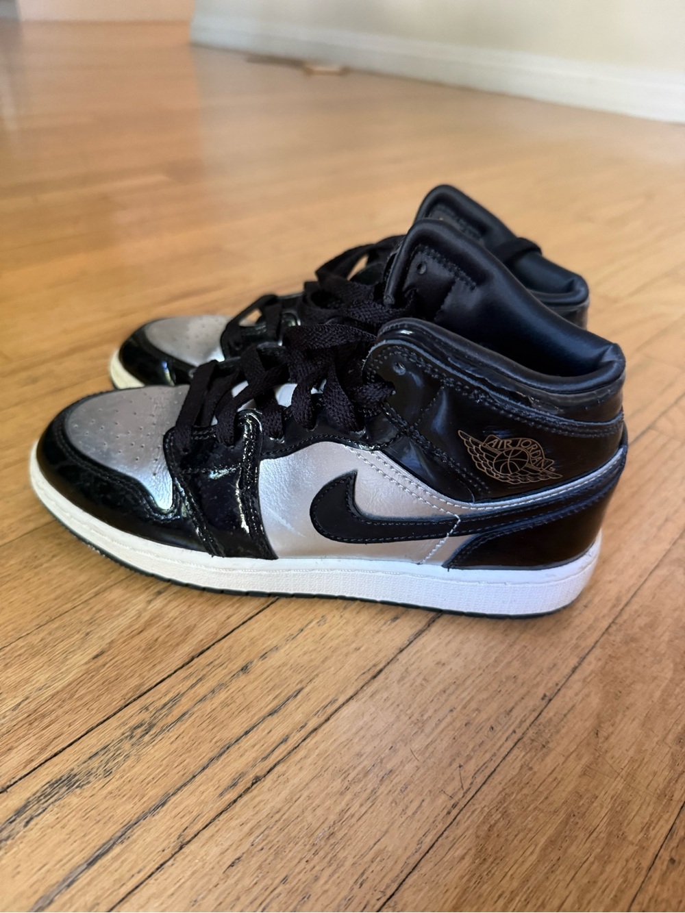 Nike Kids Black and Silver Jordans.